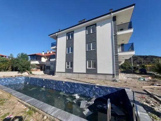 2 1 Flats For Sale On The Middle Floor Of A Brand New 3-Storey Building With A Swimming Pool In The Center Of Muğla Ortaca