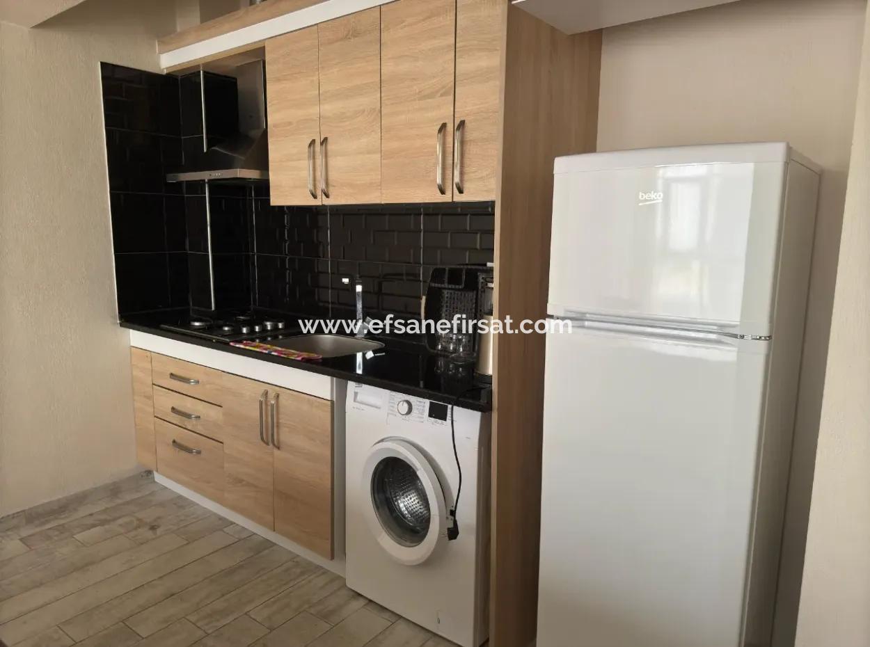 Ortaca Çarşı Merkezde Eşyalı 1+1 Geniş Daire Kiralık.