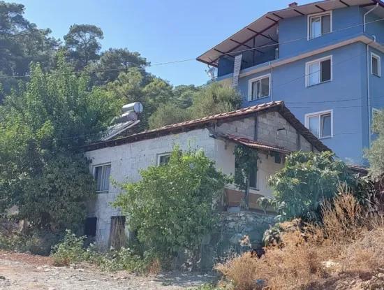 Muğla Ortaca Sarıgerme Merkezde  485 M² İmarlı Satılık Arsa – Köy Evi + Depolu